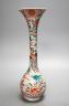 A Chinese Swatow style bottle vase, painted in green and iron red enamels with phoenixes amid flowers and clouds, 31.5cm                                                                                                    