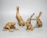 Pierre Chenet Foundry, four small patinated bronzes of a toad, two hares and a duck, largest 19cm high, signed                                                                                                              