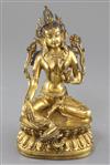 A gilt Tibetan gilt bronze seated figure of Green Tara, 18th century, height 21.5cm                                                    