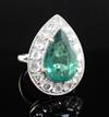 An 18ct white gold, emerald and diamond pear shaped dress ring, size N.                                                                