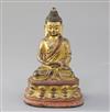 A Sino-Tibetan gilt and polychrome bronze seated figure of Buddha Shakyamuni, 17th/18th century, H. 16.5cm                             