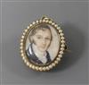 A 19th century yellow metal and split pearl set portrait miniature pendant brooch, 24mm.                                               