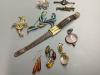 Assorted jewellery including a 9ct and gem set bar brooch, 925 and costume and a Raymond Weil gold plated watch.                                                                                                            