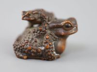 A fine Japanese wood okimono of toads, signed Masanao, 19th century,                                                                   