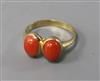 A 14ct gold and double coral bead set ring, size S.                                                                                    