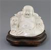 A Chinese blanc-de-chine figure of Budai, 19th century, H. 14cm including hongmu stand                                                 