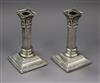 A pair of late Victorian silver corinthian column dwarf candlesticks (no sconces), Sheffield, 1897, 14cm.                              