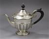 A late Victorian silver bachelor's teapot, Sheffield, 1893, gross 8.5 oz.                                                              