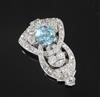 An Art Deco platinum?, blue zircon, rose and round cut diamond set lapel clip, 35mm.                                                   