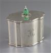 An Edwardian silver serpentine tea caddy with stained carved ivory knop, by James Parkes, gross 10 oz.                                 