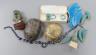 A small collection of Egyptian artefacts including necklace, scarabs, rings and a later scarab, part of the Josephine Dubois collection                                                                                     