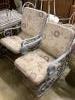 A pair of painted wrought iron garden rocking armchairs with cushion seats, width 57cm, depth 86cm, height 93cm                                                                                                             