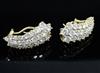 A pair of 14ct gold and diamond encrusted earrings, 27mm.                                                                              