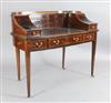 An Edwardian satinwood banded mahogany Carlton House desk, W.4ft D.2ft 1in. H.3ft 3in.                                                 