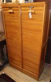 A double tambour shutter filing cabinet W.79cm                                                                                         