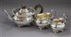 An Edwardian three piece silver tea set, Reid & Sons, London, 1909, gross 40 oz.                                                       