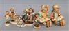 Seven Hummel figures and a Dresden porcelain figure                                                                                    