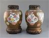 A pair of Chinese export Batavia ware famille rose jars, 18th century, H. 21cm, wood covers and stands                                 