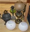 Four various oil lamps                                                                                                                 