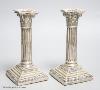 A pair of late Victorian silver Corinthian column dwarf candlesticks, Atkin Brothers, Sheffield, 1899, 17.6cm, weighted.                                                                                                    