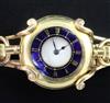 An early 20th century 18ct gold half hunter fob watch with a 15ct gold bracelet,                                                       