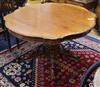 A Victorian mahogany shaped oval dining table L.124cm                                                                                  