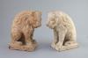A pair of European pink marble seated lions, 18th century or earlier, 25cm high                                                                                                                                             