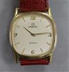 A gentleman's gold plated and steel Omega de Ville wrist watch, no winding crown.                                                      