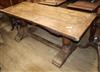 An 18th / 19th century oak rectangular plank top refectory dining table L.183cm                                                        