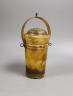 A 19th century horn portable beaker, 23 cms high including handle.                                                                                                                                                          