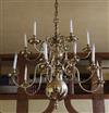 A late 19th century Dutch brass twelve light chandelier, length 39in.                                                                  