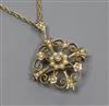 An Edwardian 9ct gold and seed pearl set pendant brooch, on a later 9ct gold ropetwist chain, pendant 26mm.                            