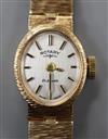 A lady's Rotary 9ct gold wristwatch on textured bracelet.                                                                              