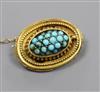 A Victorian yellow metal and turquoise set oval brooch, 23mm.                                                                          