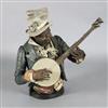 A Goldscheider cold painted terracotta bust of a banjo player, 30in.                                                                   
