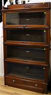 A Globe Wernicke serpentine mahogany four-section bookcase, c.1900, W.91cm                                                             