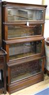 An Inglesants walnut four-section glazed bookcase flanked by reeded columns W.87cm                                                     