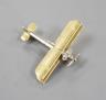 An early 20th century 15ct, white metal and three stone diamond set bi-plane brooch, with revolving propeller, 31mm, gross weight 4.6 grams.                                                                                