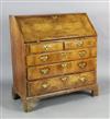 A George II walnut bureau, W.3ft 2in. D.1ft 8in. H.3ft 4.5in.                                                                          