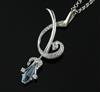 A stylish modern platinum, shaped cut aquamarine and diamond set spray pendant, on a 9ct white gold chain,                             