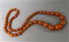 A single strand reconstituted? amber necklace, 66cm                                                                                    