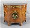 An Edwardian Sheraton revival painted satinwood demi lune side cabinet, W.3ft 8in. D.1ft 10in. H.2ft 10in.                             