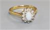 A modern 18ct gold, white opal and diamond cluster ring, size O.                                                                       