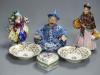 A Continental blue and white nodding figure of a Chinese man, two other figures and three other items                                                                                                                       