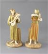 A pair of Royal Worcester Egyptian musicians by James Hadley, c.1891, height 22.5cm                                                    