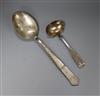 A Danish white metal basting? spoon and a Danish white metal sauce ladle.                                                              