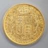 A Victorian 1861 gold young head shield back sovereign, London Mint (1 over lower 1).                                                                                                                                       