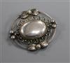 A Danish Georg Jensen sterling silver oval leaf and berry brooch, no. 91, 45mm.                                                        