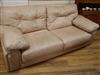 A pair of Roche Bobois peach leather two seater sofas L. 220cm approx.                                                                 