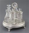 A George III silver oval cruet stand by Burwash & Sibley, 32.5 oz.                                                                     